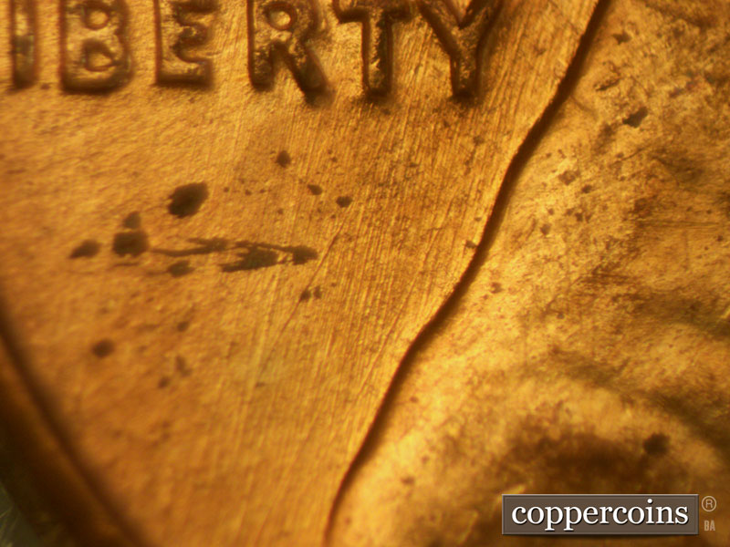 Die-stage B marker on 1960D•1MM•109 (1960 Repunched Mint Mark).