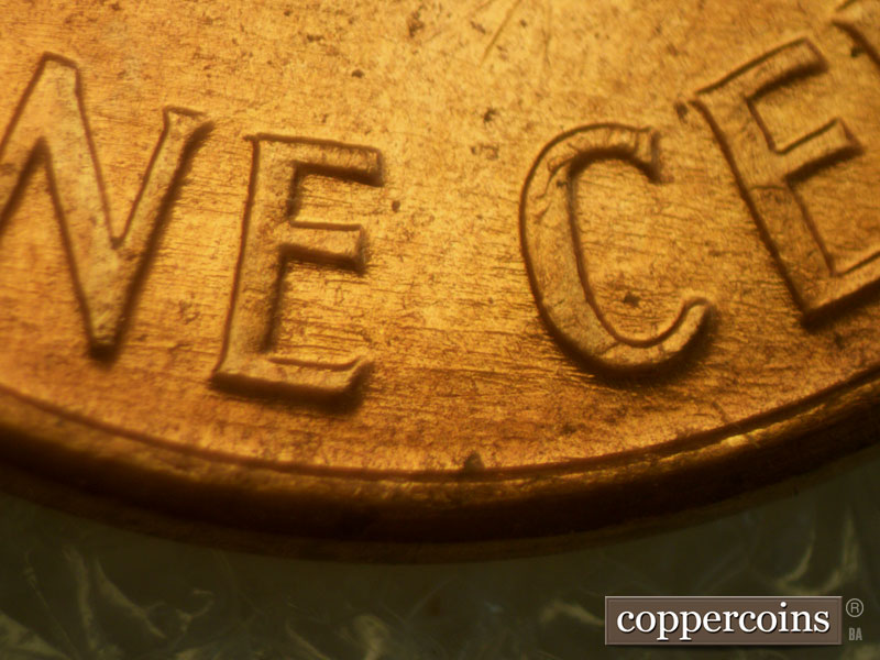 Die-stage B marker on 1960D•1MM•109 (1960 Repunched Mint Mark).
