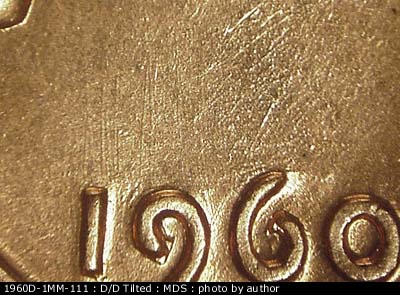 Die-stage B marker on 1960D•1MM•111 (1960 Repunched Mint Mark).