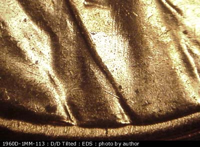 Die-stage A marker on 1960D•1MM•113 (1960 Repunched Mint Mark).