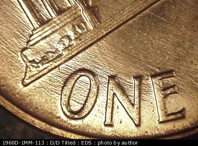 Die-stage A marker on 1960D•1MM•113 (1960 Repunched Mint Mark).