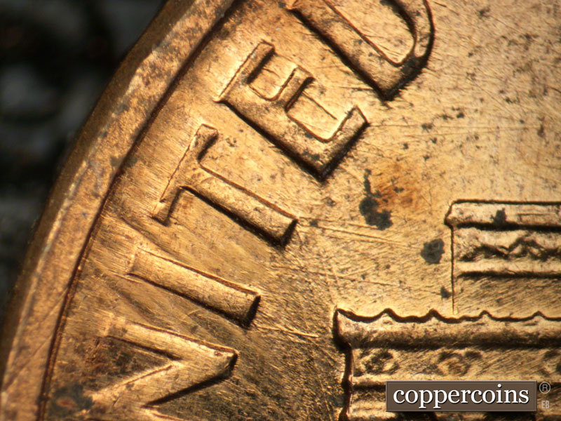 Die-stage B marker on 1960D•1MM•113 (1960 Repunched Mint Mark).