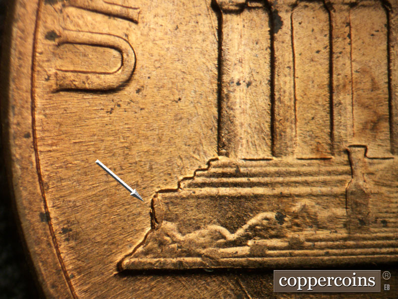 Die-stage B marker on 1960D•1MM•113 (1960 Repunched Mint Mark).