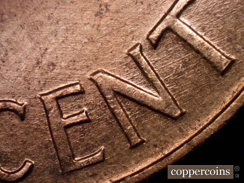 Die-stage A marker on 1960D•1MM•114 (1960 Repunched Mint Mark).