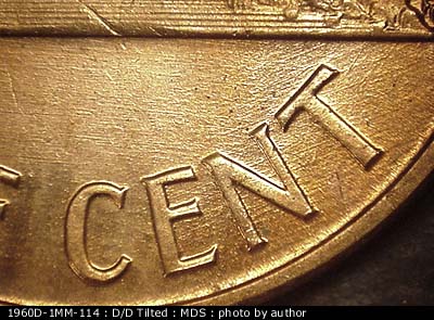 Die-stage B marker on 1960D•1MM•114 (1960 Repunched Mint Mark).