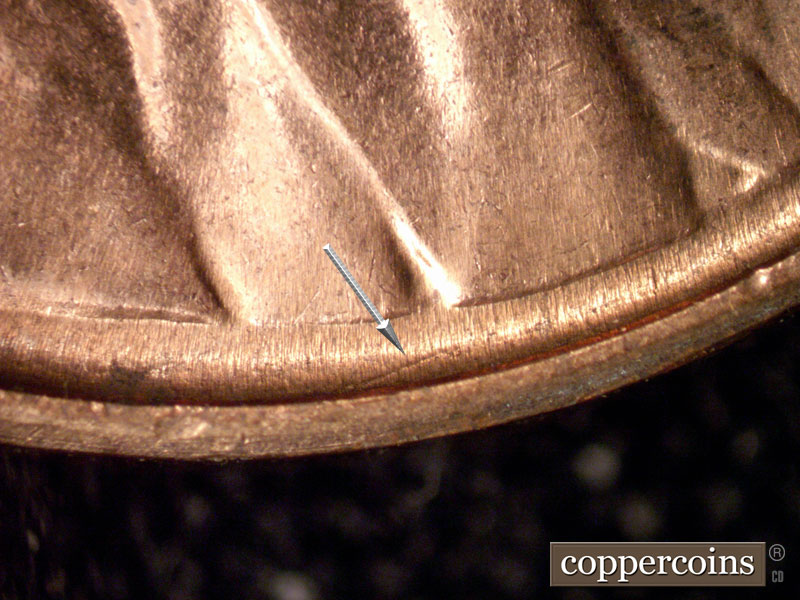 Die-stage B marker on 1960D•1MM•116 (1960 Repunched Mint Mark).