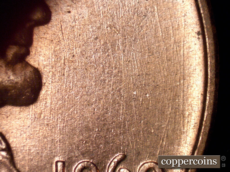 Die-stage B marker on 1960D•1MM•116 (1960 Repunched Mint Mark).