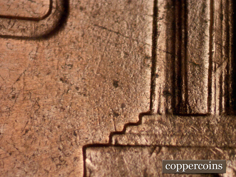 Die-stage B marker on 1960D•1MM•116 (1960 Repunched Mint Mark).