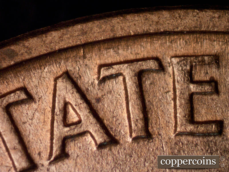 Die-stage B marker on 1960D•1MM•116 (1960 Repunched Mint Mark).