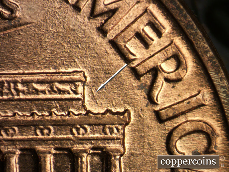 Die-stage A marker on 1960D•1MM•117 (1960 Repunched Mint Mark).
