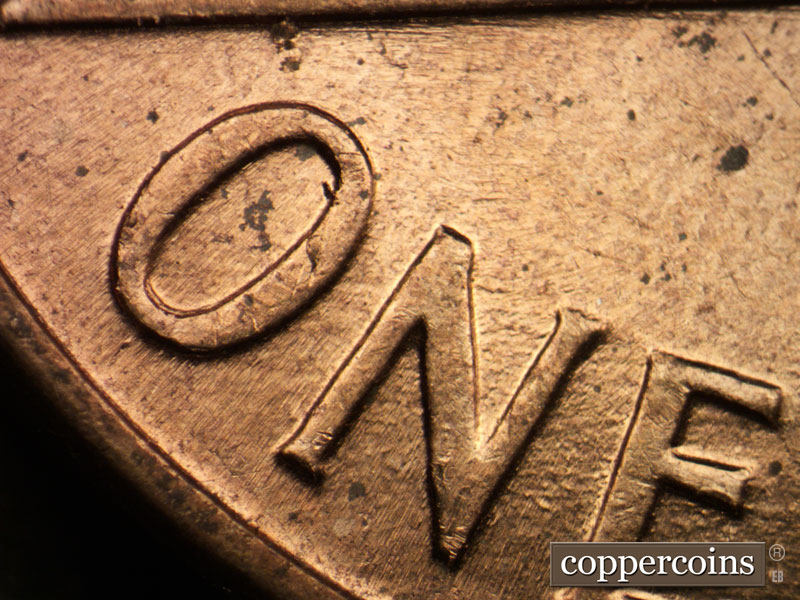 Die-stage A marker on 1960D•1MM•117 (1960 Repunched Mint Mark).