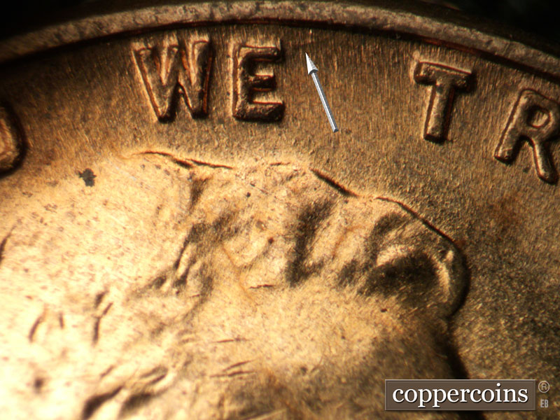 Die-stage B marker on 1960D•1MM•117 (1960 Repunched Mint Mark).