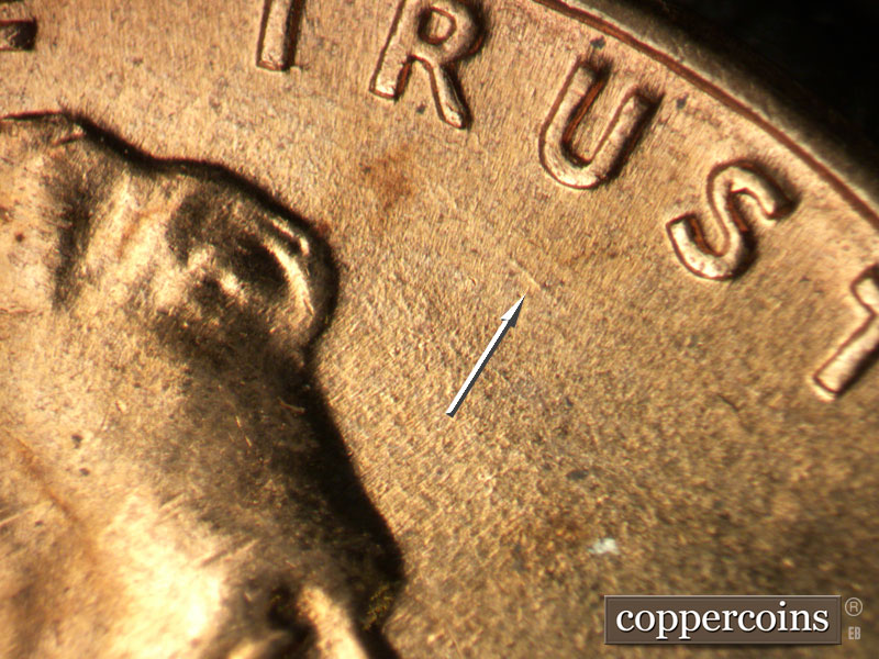 Die-stage B marker on 1960D•1MM•117 (1960 Repunched Mint Mark).
