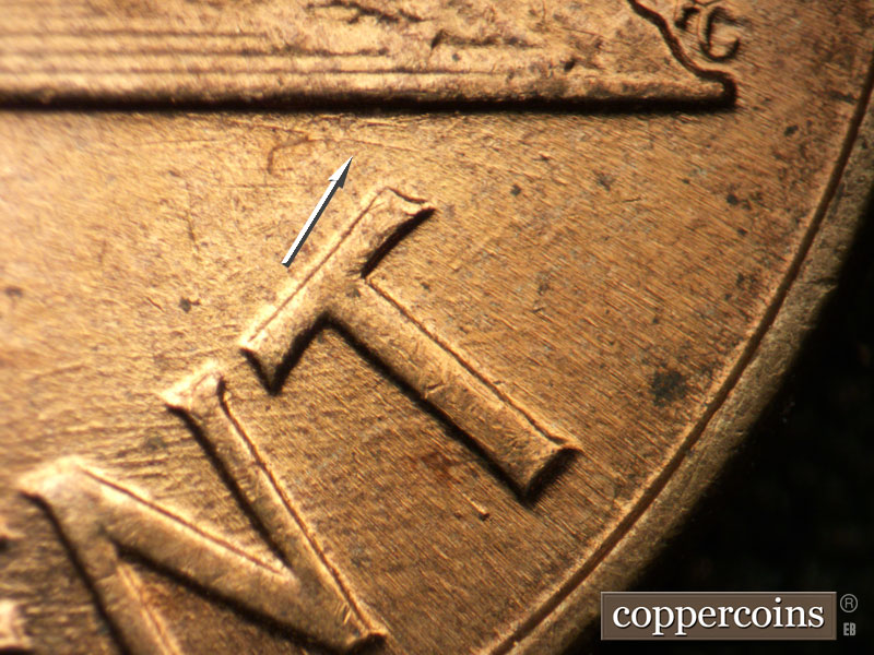 Die-stage B marker on 1960D•1MM•117 (1960 Repunched Mint Mark).