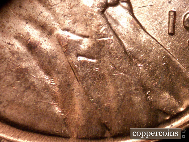 Die-stage B marker on 1960D•1MM•120 (1960 Repunched Mint Mark).