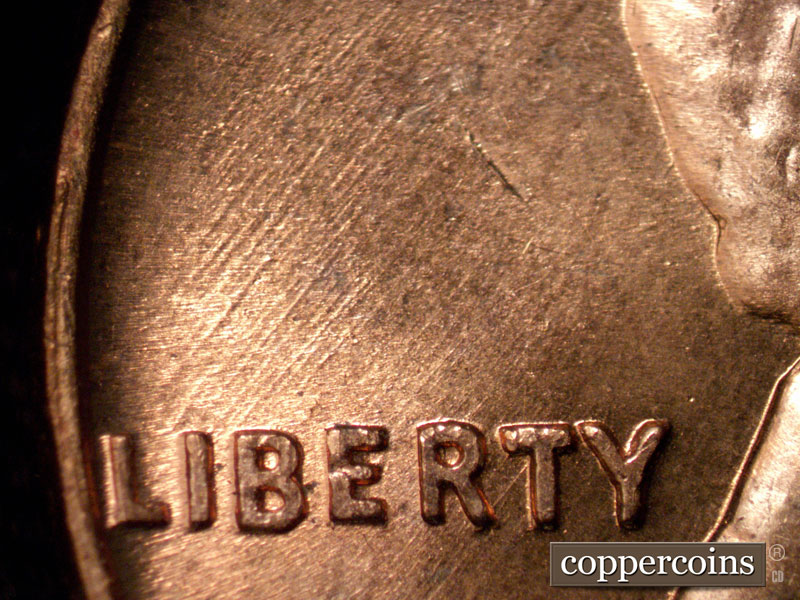 Die-stage B marker on 1960D•1MM•120 (1960 Repunched Mint Mark).
