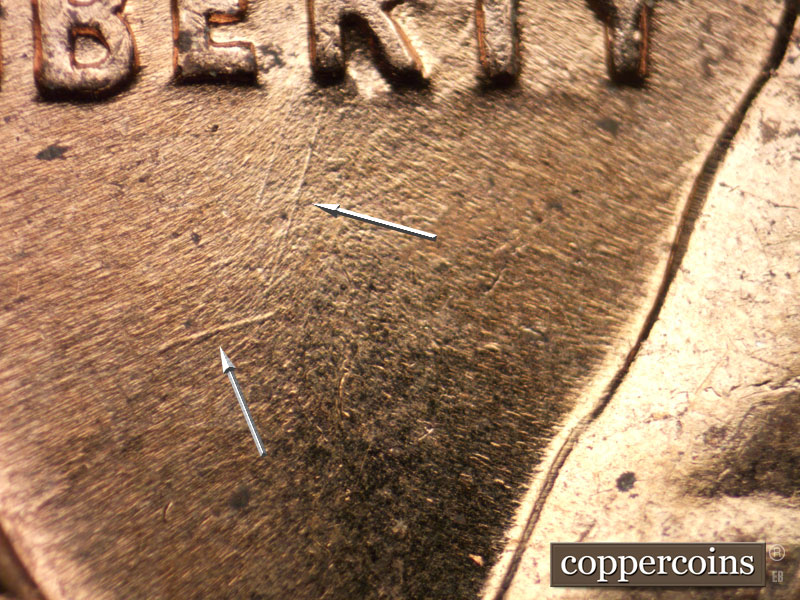 Die-stage B marker on 1960D•1MM•121 (1960 Repunched Mint Mark).