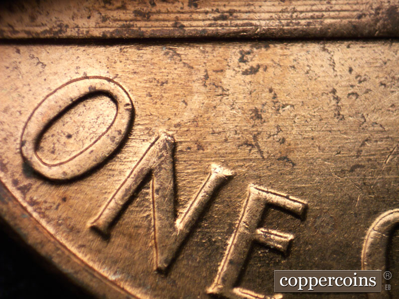 Die-stage B marker on 1960D•1MM•121 (1960 Repunched Mint Mark).