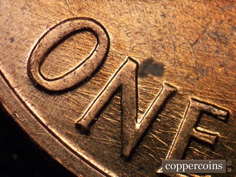 Die-stage B marker on 1960D•1MM•122 (1960 Repunched Mint Mark).