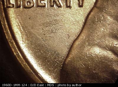 Die-stage B marker on 1960D•1MM•124 (1960 Repunched Mint Mark).