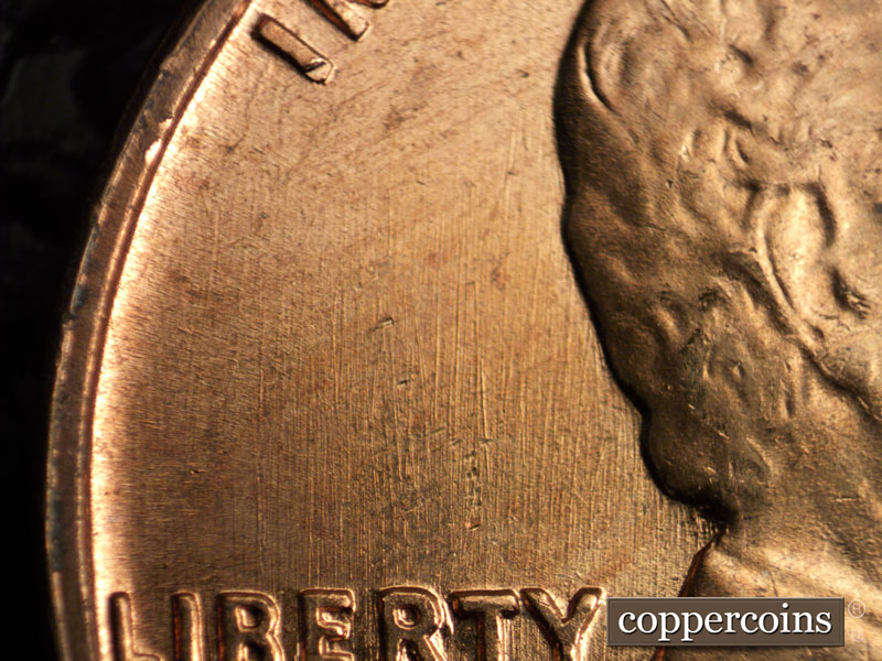 Die-stage B marker on 1960D•1MM•125 (1960 Repunched Mint Mark).