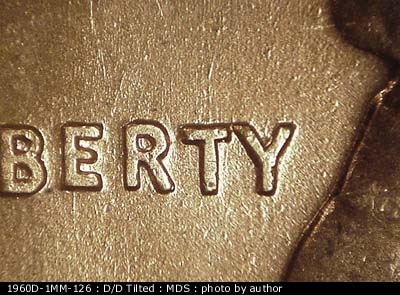 Die-stage B marker on 1960D•1MM•126 (1960 Repunched Mint Mark).