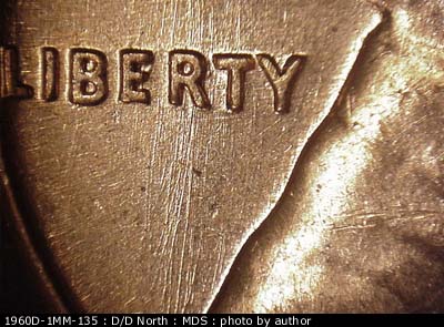 Die-stage B marker on 1960D•1MM•135 (1960 Repunched Mint Mark).
