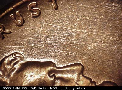 Die-stage B marker on 1960D•1MM•135 (1960 Repunched Mint Mark).