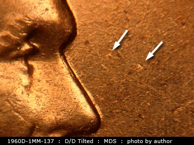 Die-stage B marker on 1960D•1MM•137 (1960 Repunched Mint Mark).