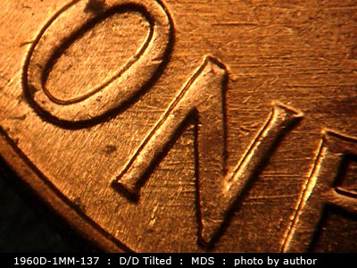 Die-stage B marker on 1960D•1MM•137 (1960 Repunched Mint Mark).