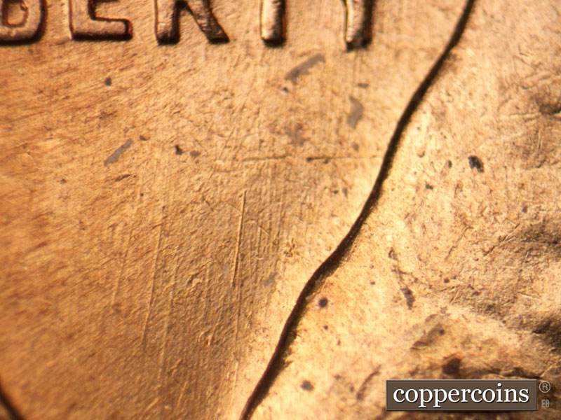 Die-stage B marker on 1960D•1MM•138 (1960 Repunched Mint Mark).