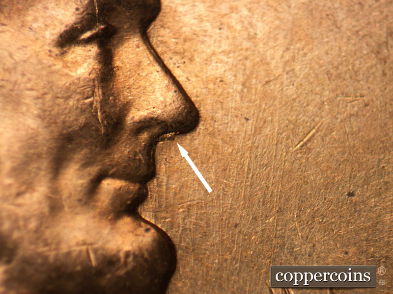 Die-stage B marker on 1960D•1MM•138 (1960 Repunched Mint Mark).