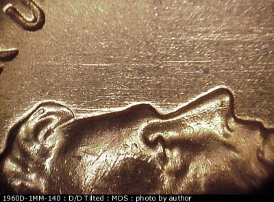 Die-stage B marker on 1960D•1MM•140 (1960 Repunched Mint Mark).