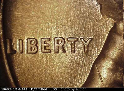 Die-stage C marker on 1960D•1MM•141 (1960 Repunched Mint Mark).