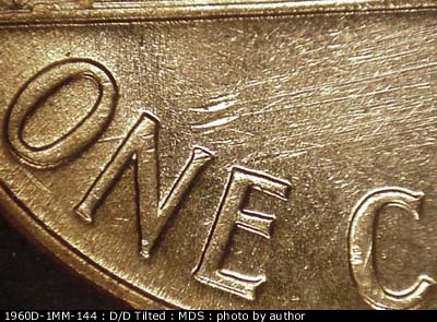 Die-stage B marker on 1960D•1MM•144 (1960 Repunched Mint Mark).