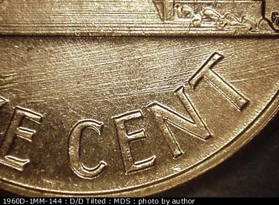 Die-stage B marker on 1960D•1MM•144 (1960 Repunched Mint Mark).