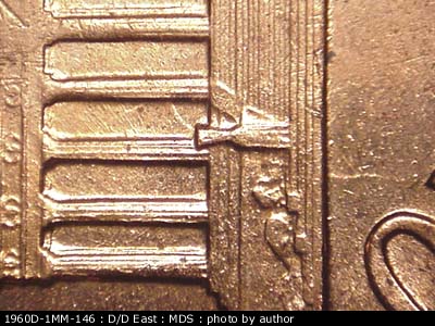 Die-stage B marker on 1960D•1MM•146 (1960 Repunched Mint Mark).