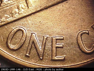 Die-stage B marker on 1960D•1MM•146 (1960 Repunched Mint Mark).