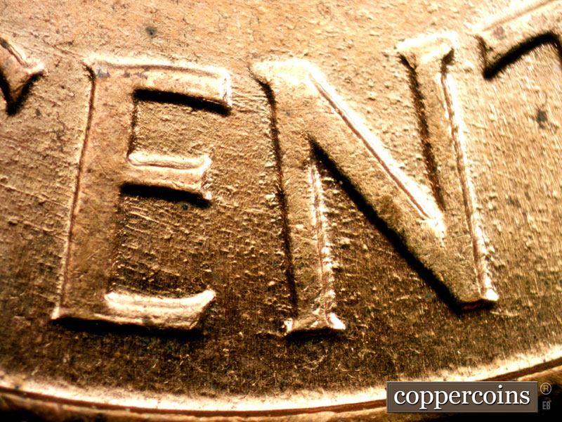 Die-stage B marker on 1960D•1MM•147 (1960 Repunched Mint Mark).