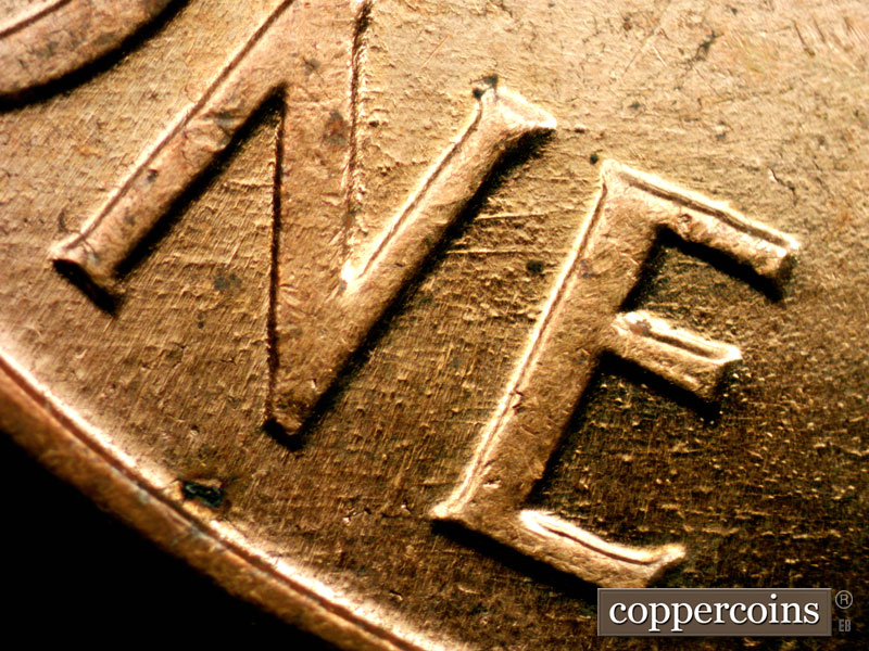 Die-stage B marker on 1960D•1MM•147 (1960 Repunched Mint Mark).