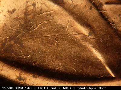 Die-stage B marker on 1960D•1MM•148 (1960 Repunched Mint Mark).