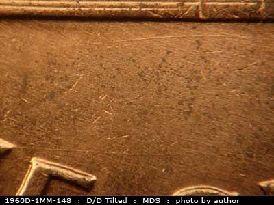 Die-stage B marker on 1960D•1MM•148 (1960 Repunched Mint Mark).