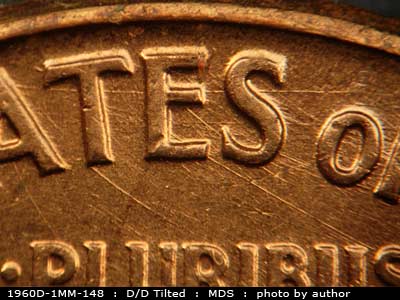 Die-stage B marker on 1960D•1MM•148 (1960 Repunched Mint Mark).
