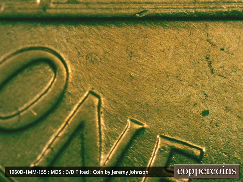 Die-stage B marker on 1960D•1MM•155 (1960 Repunched Mint Mark).