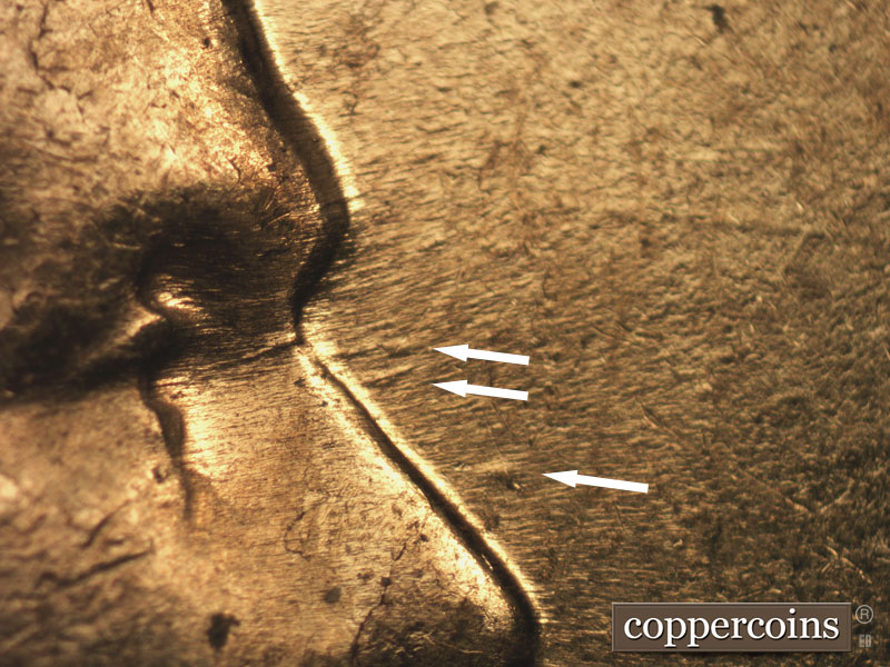 Die-stage B marker on 1960D•1MM•158 showing Die gouges in front of nose.
