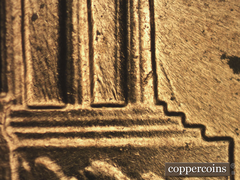 Die-stage B marker on 1960D•1MM•158 showing NW die scratch from top of right base into column 12.