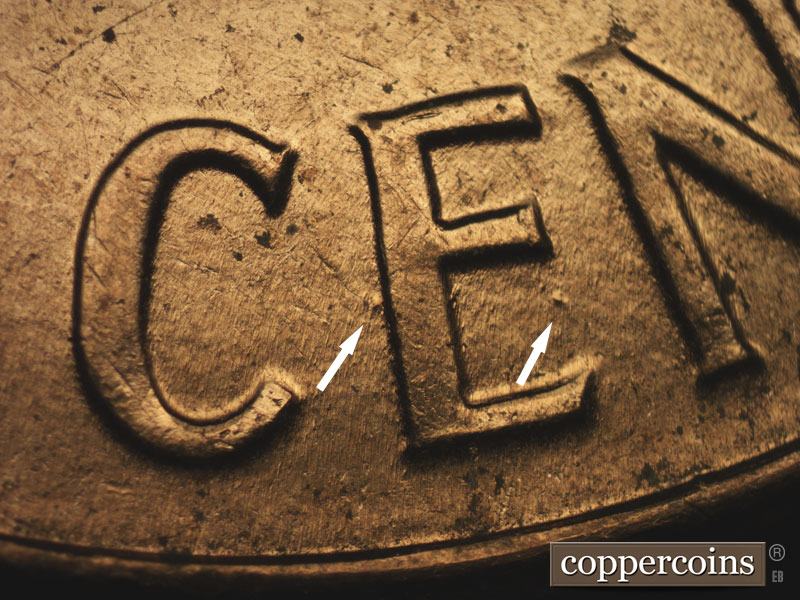 Die-stage B marker on 1960D•1MM•158 showing Die dot in lower E of CENT. Die dot behind vertical of E in CENT.