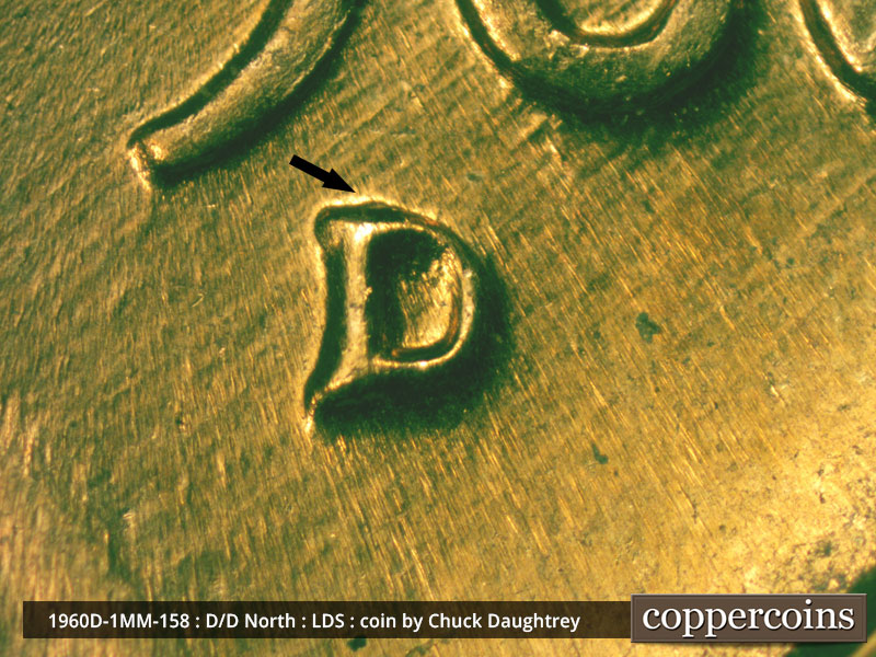 Die-stage D marker on 1960D•1MM•158 showing Closeup of repunched mint mark.