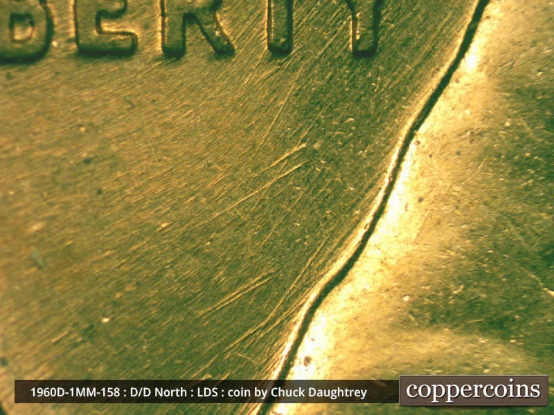 Die-stage D marker on 1960D•1MM•158 showing SW die scratches under TY in LIBERTY.