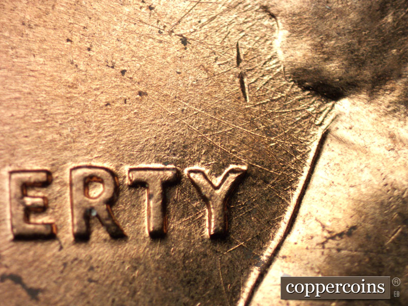 Die-stage B marker on 1960D•1MM•159 (1960 Repunched Mint Mark).